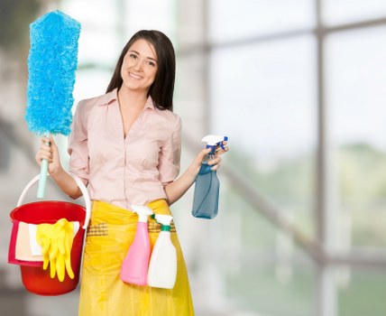 Professional home cleaner in a Mayfair luxury living room