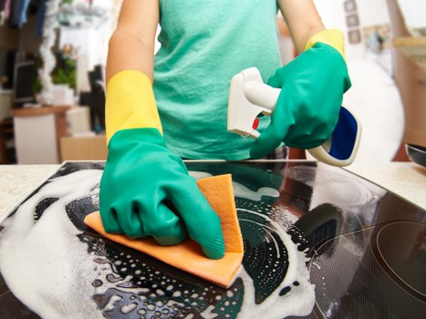 Cleaning team working in a residential property during scheduled service